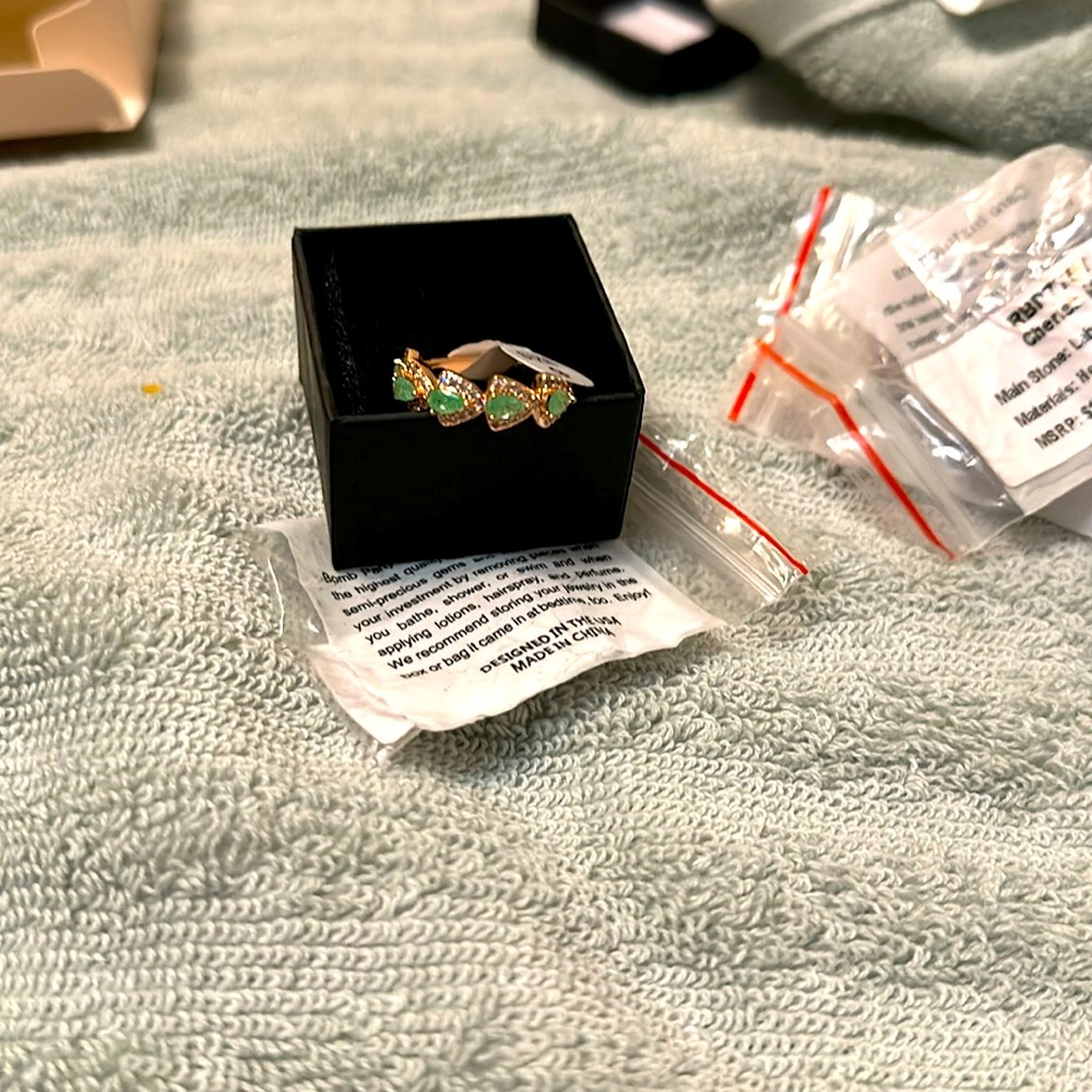 Silver and Green Stone Ring with Elegant Design